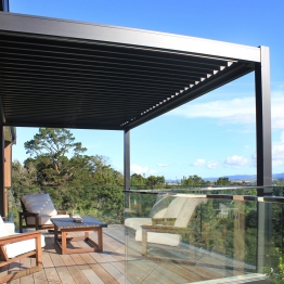 Bask louvre roof frames this stunning Auckland view perfectly