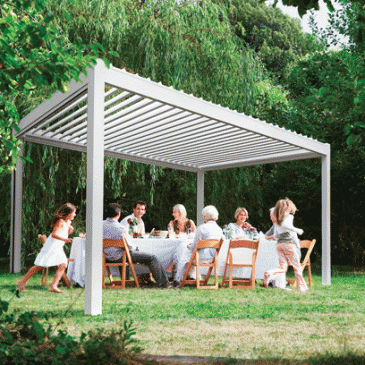 Freestanding Bask Louvre roof with family in summer picnic