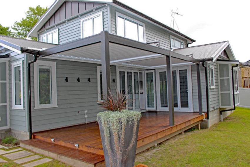Twin bay Bask louvre roof fitted on large outdoor deck NZ